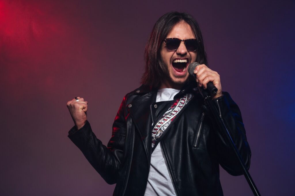 man singing into microphone